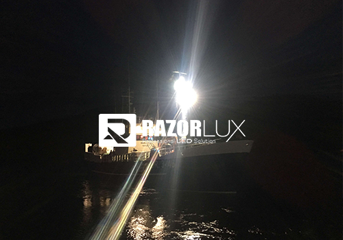 How do LED flood lights improve maritime safety and security?